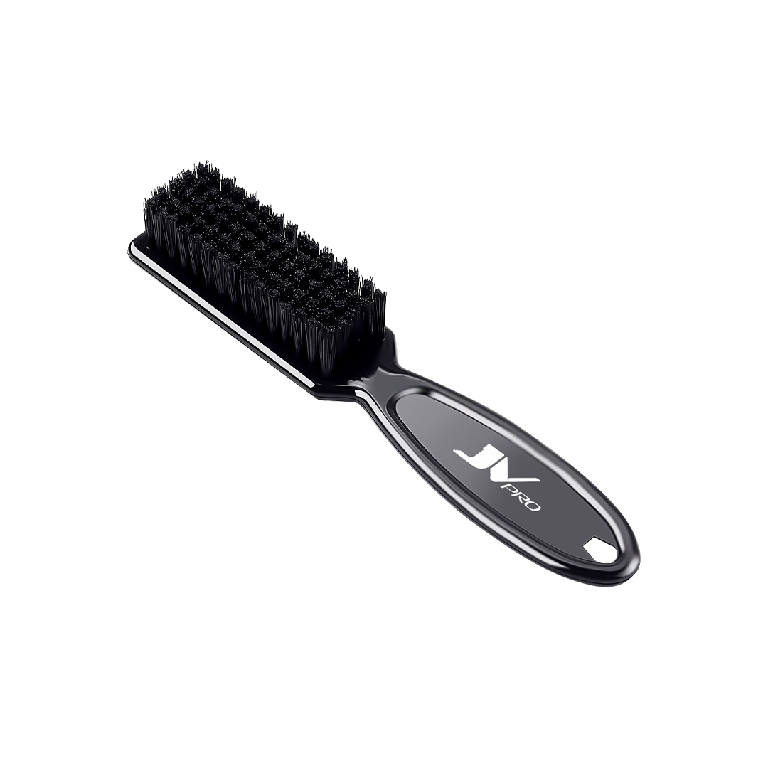 “JV PRO cleaning brush for barbers, perfect for clipper maintenance and tool care.”
